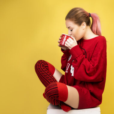 Girl drinking hot coffee