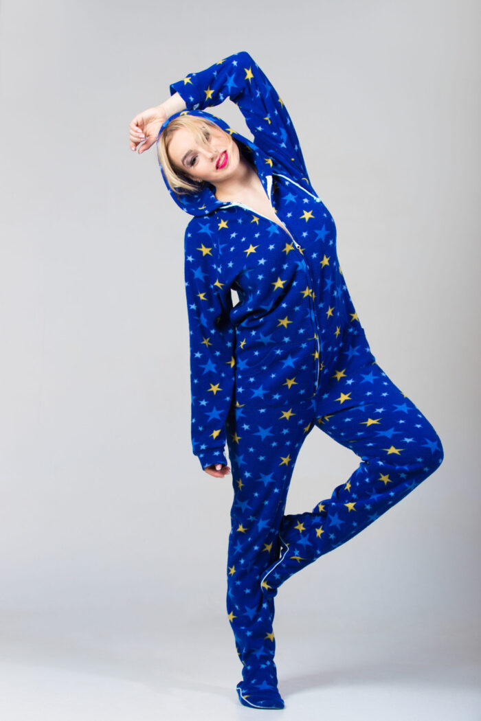 Beautiful girl dancing in funny pajamas